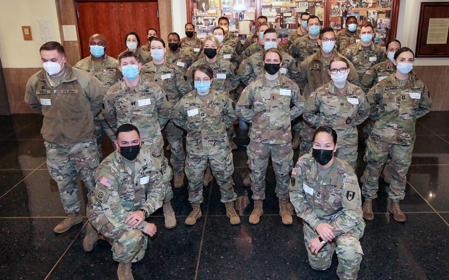 A team of military medical personnel at Rhode Island Hospital. Beginning February 18, two U.S. Department of Defense teams each consisting of 20 military medical personnel will  support medical staff at Northern Light Eastern Maine Medical Center in Bangor, Maine.