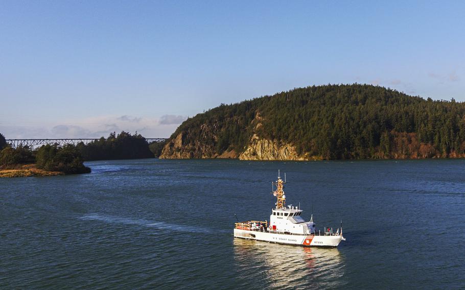 Coast Guard Cutter Adelie [WPB 87333] transits near Deception Pass, Wash., Dec. 11, 2021. Several Coast Guard units were in the area to assist when several kayakers capsized during a scheduled race. (U.S. Coast Guard photo)