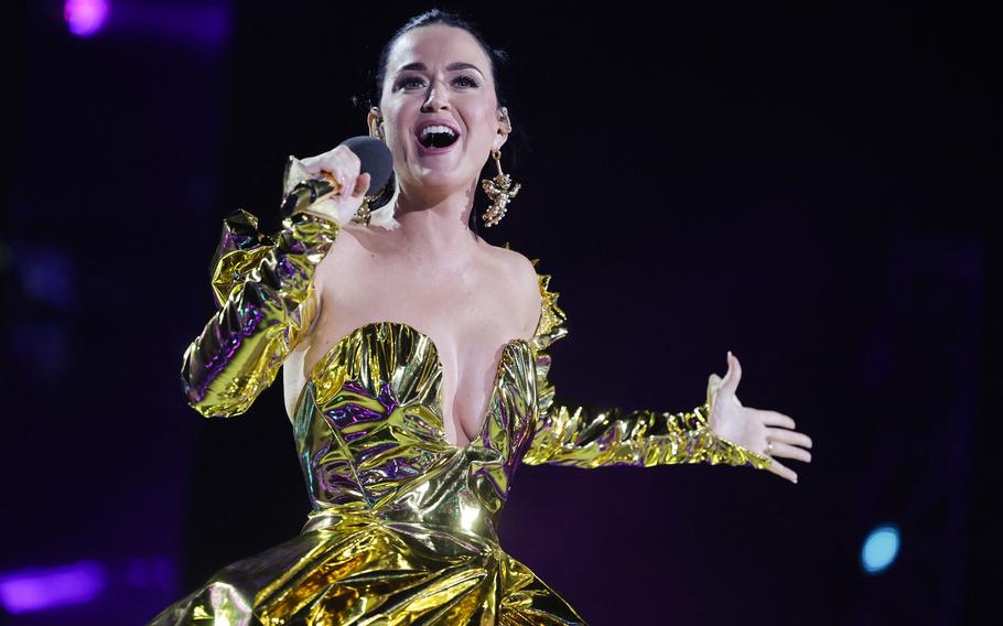 Katy Perry performs inside Windsor Castle grounds at the Coronation Concert, in Windsor, west of London, on May 7, 2023. Perry said in an interview at the 2011 MTV Awards that her song “Firework” was a metaphor for the inner self and that she believed everyone has that spark: She was influenced by Jack Keuroac’s 1957 novel, “On The Road,” when she read an excerpt about “people that are buzzing and fizzing and full of life and never say a commonplace thing. They shoot across the sky like a firework and make people go ‘Ahhh.’ I guess that making people go ‘ahhh’ is kind of like my motto.”