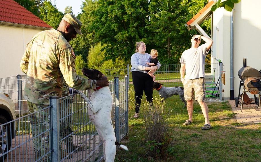 Col. Kevin Poole, commander of U.S. Army Garrison Bavaria, speaks with residents Aug. 24, 2022, to get a better understanding of local housing conditions. The U.S. military is asking personnel living abroad to complete the annual housing allowance survey, which runs through March 31.