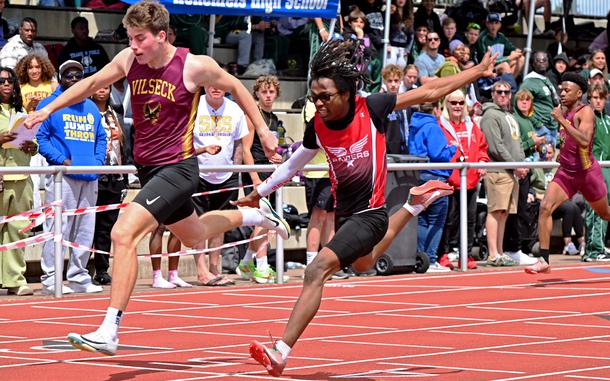 Vilseck’s Samual Broyles edges out Kaiserslautern’s Quincy Seaberry in the boys 200-meter race at the 2025 DODEA-Europe track and field finals in Kaiserslautern, Germany. Broyles crossed the finish line in 22.86 seconds to Seaberry’s 22.88.