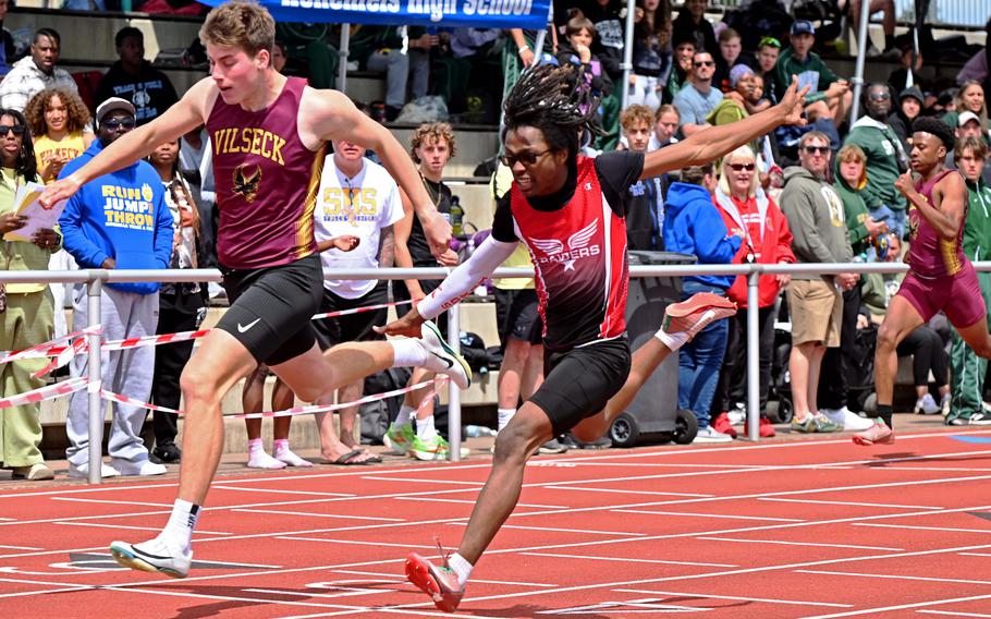Vilseck’s Samual Broyles edges out Kaiserslautern’s Quincy Seaberry in the boys 200-meter race at the 2025 DODEA-Europe track and field finals in Kaiserslautern, Germany. Broyles crossed the finish line in 22.86 seconds to Seaberry’s 22.88.