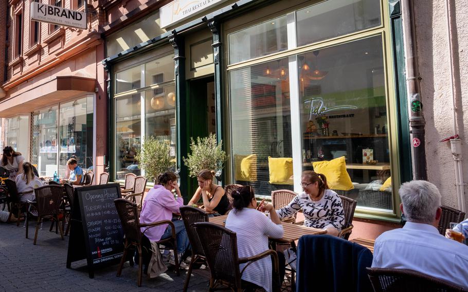 Diners eat al fresco at Tida Thai Restaurant in downtown Kaiserslautern, Sept. 21, 2023. 