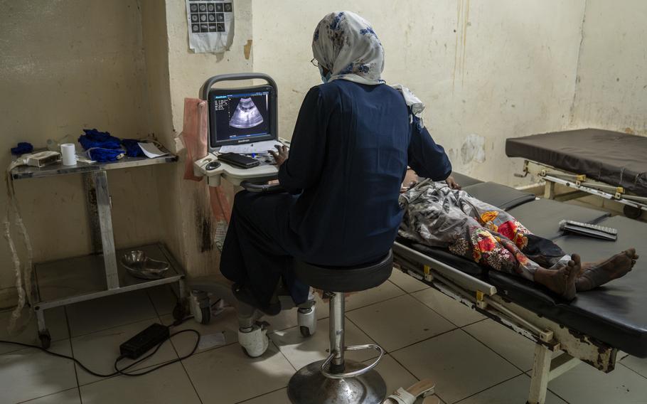 A technician performs an ultrasound during a prenatal checkup at the Doctors Without Borders-run maternity ward at El Geneina Teaching Hospital.