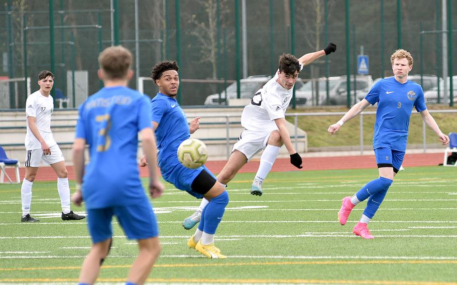 SHAPE's Santiago Torrente de la Pisa shoots during a soccer match against Ramstein on April 5, 2024, at Ramstein High School on Ramstein Air Base, Germany.