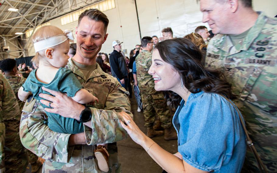 Staff Sgt. Vincent Humerickhouse, a member of Task Force Tomahawk, reunites with family members at Will Rogers Air National Guard Base in Oklahoma City, Feb. 23, 2024. 