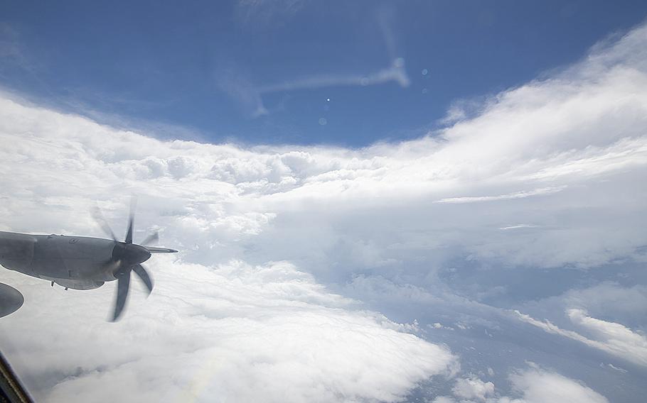 A WC-130J Super Hercules aircraft assigned to the 53rd Weather Reconnaissance Squadron from Keesler Air Force Base, Miss., flies in the eye of Hurricane Ian on Tuesday Sept. 27, 2022.