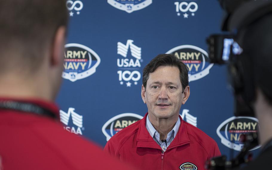 President and CEO of USAA Wayne Peacock speaks in Philadelphia on Friday, Dec. 9, 2022, during a charity event in which two wounded veterans received free vehicles.