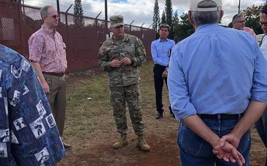 Jim Alberts, senior vice president and chief operating officer for Hawaiian Electric, left, tours the Menoher substation at Schofield Barracks, Hawaii, Aug. 12, 2022, with Brig. Gen. Cain Baker, deputy commanding general of sustainment.