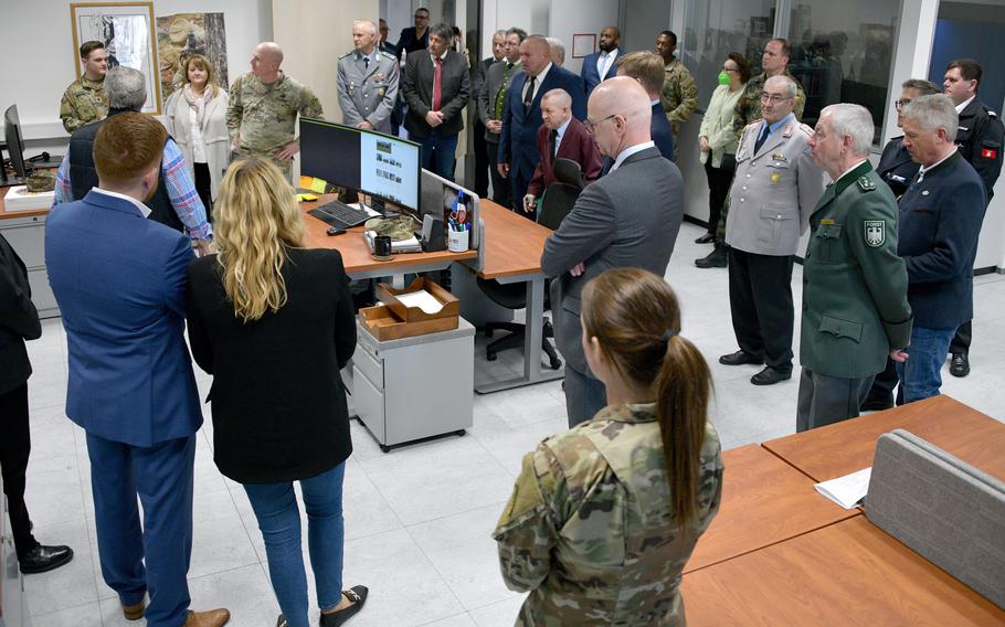Invited guests explore the Training Support Center at the Grafenwoehr Training Area, Germany, March 22, 2023. The new center combines all training aids, devices, simulators, classrooms and visual information in one building. 