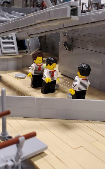 LEGO minifigures wearing sailor outfits on a LEGO ship