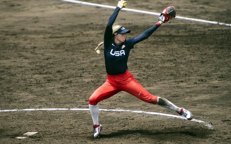 Ally Carda of the U.S. Women’s Olympic softball team, winds up during an exhibition game against the Toyota Red Terriers in Iwakuni, Japan, Monday, July 12, 2021. 