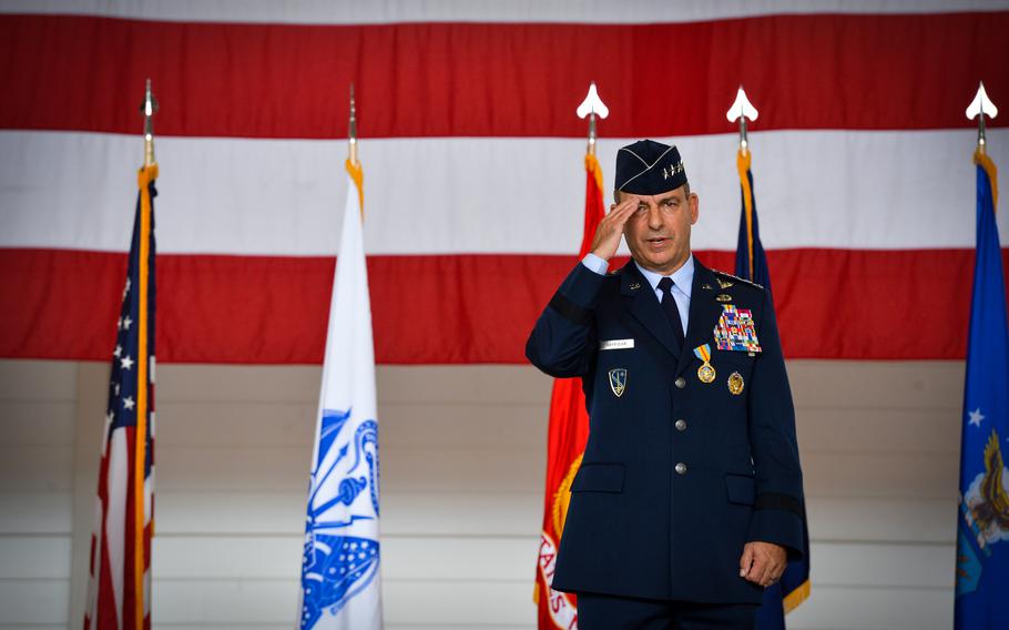 Gen. Jeffrey L. Harrigian, U.S. Air Forces in Europe-Air Forces Africa and NATO Allied Air Command commander, renders a final salute to service members before relinquishing his command on June 27, 2022, at Ramstein Air Base, Germany. 