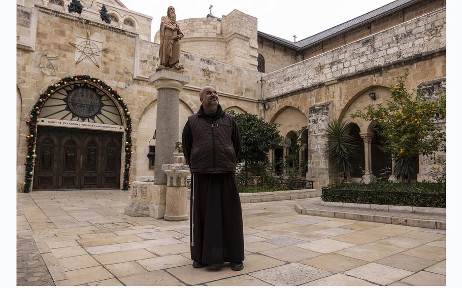 The Rev. Rami Asakrieh, in the courtyard of the Church of Saint Catherine in Bethlehem, on Dec. 21, 2023. 
