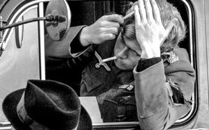 Bob Milnes/Stars and Stripes
Cherbourg, France, November, 1964: An actor playing a bedraggled German World War II soldier takes time to comb his hair during a break in the filming of "Up from the Beach," a story about the days following the D-Day landings in Normandy.