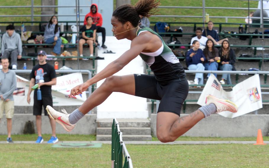 Carlos Cadet clears a hurdle.