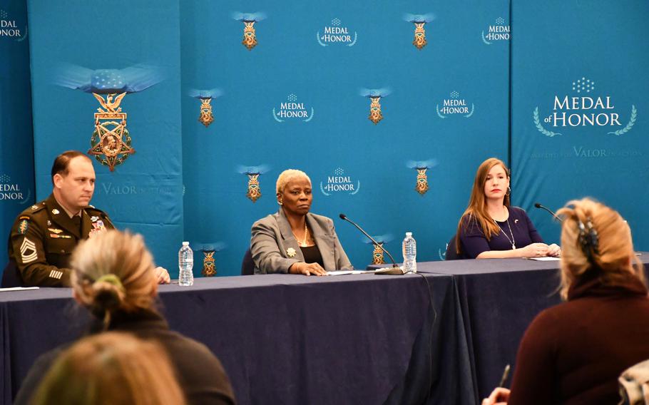 From left, Master Sgt. Earl Plumlee, Kasinal Cashe-White and Katie Celiz face reporters at a news briefing Wednesday, Dec. 15, 2021, in Arlington, Va. Plumlee, as well as Sgt. 1st Class Alwyn Cashe and Sgt. 1st Class Christopher Celiz, are set to receive the Medal of Honor on Thursday, Dec. 16.  