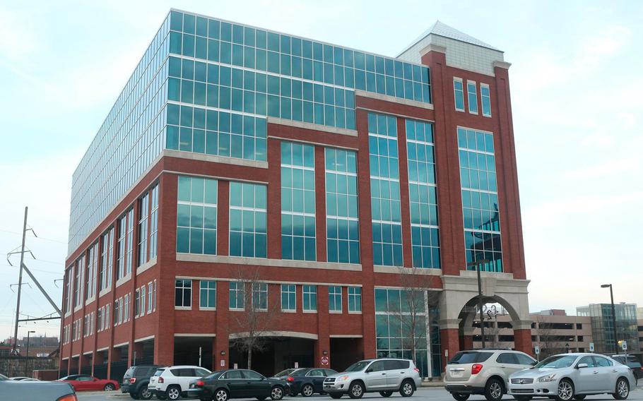 This April 2, 2014, file photo, shows the headquarters of student loan debt collector Navient Corporation, in Wilmington, Del. Pennsylvania's attorney general says the large student loan servicer Navient has settled allegations of predatory practices for $1.85 billion.