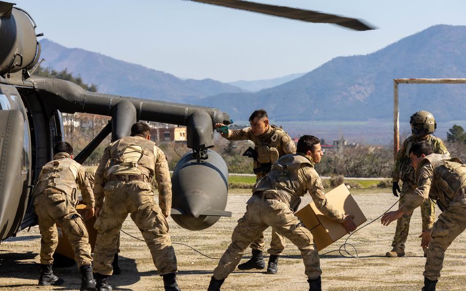 A U.S. Army UH-60M Black Hawk assigned to 1st Armored Division, Combat Aviation Brigade, delivers relief supplies to the Turkish relief authorities in Hassa, Turkey, Feb. 21, 2023.