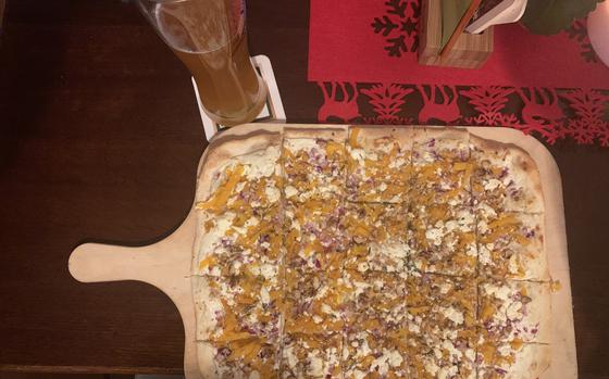 A flammkuchen with pumpkin, walnuts, rosemary and feta is a delicous, fragrant vegetarian take on the thin-crusted dish served at Nora Restaurant in downtown Kaiserslautern, a cozy spot just off the pedestrian zone.