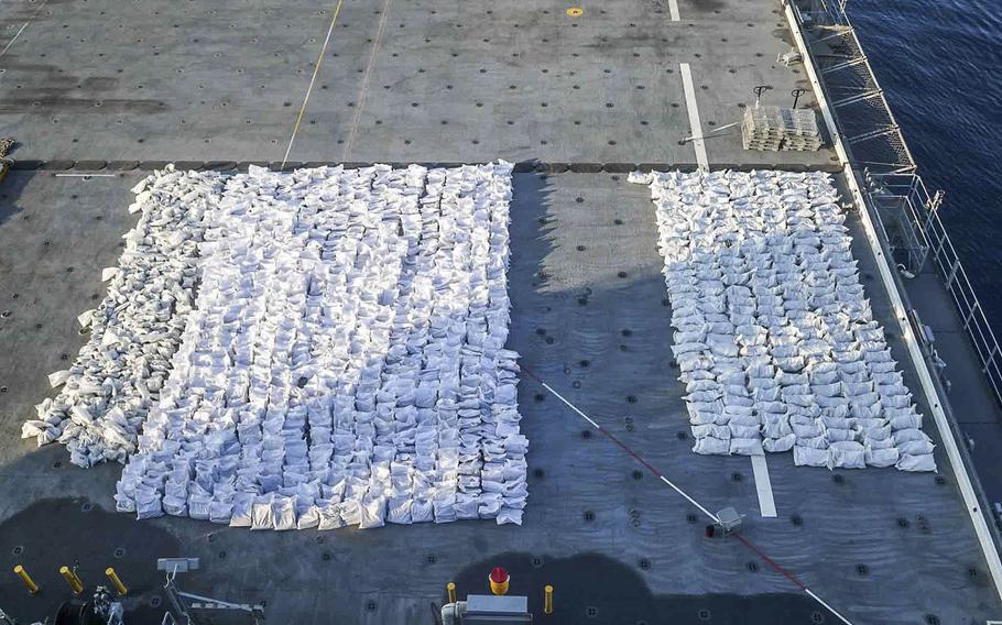 The U.S. Navy released photos of bags it says contain more than 50 tons of fuses and propellants for rockets and ammunition rounds seized from a fishing trawler Dec. 1., 2022 in the Gulf of Oman.