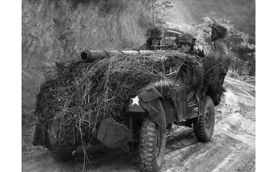 Somewhere in the mountains, South Korea, Jan. 5, 1962: Three 12th Cavalry Regiment men make their way down a mountain in a camouflaged jeep with a 106 mm recoilless rifle mounted atop of it. Troops of the 12th Cav. are participating in a month-long Army training test. The training, which began Jan. 2, is held in the mountain areas of South Korea where the cavalrymen honed their skills in varied terrains such as jungles and expansive open agricultural paddies. 

Looking for Stars and Stripes’ historic coverage? Subscribe to Stars and Stripes’ historic newspaper archive! We have digitized our 1948-1999 European and Pacific editions, as well as several of our WWII editions and made them available online through https://starsandstripes.newspaperarchive.com/

META TAGS: Pacific; South Korea; training; exercise; 12th Cavalry Regiment; 1st Cavalry Division; U.S. Army; African-American