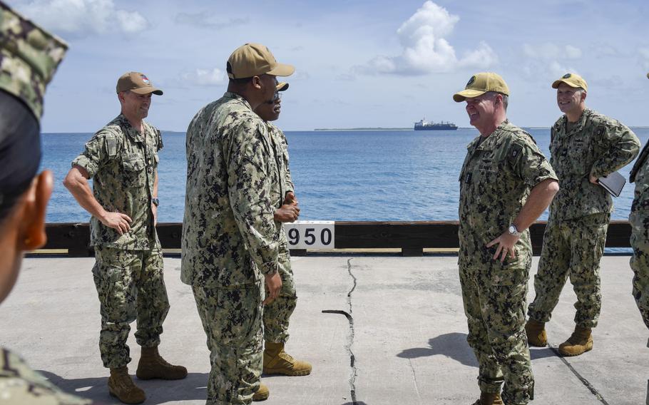 U.S. Pacific Fleet commander Adm. Samuel Paparo, third from right, speaks with sailors at Naval Support Facility Diego Garcia, Dec. 9, 2022.