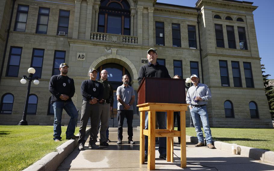 Officials give a news conference.