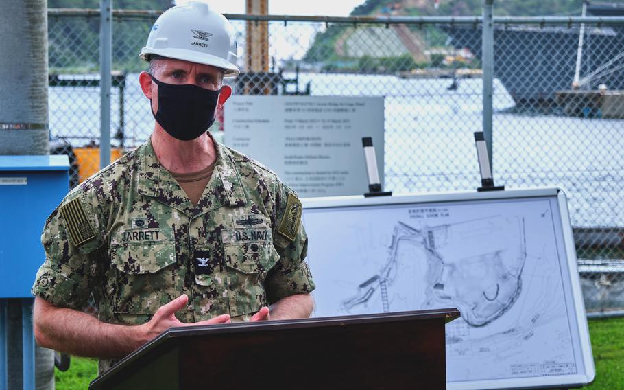 Navy Capt. Rich Jarrett, commander of Yokosuka Naval Base, speaks during a groundbreaking ceremony for a new combat loading wharf in Yokosuka, Japan, on Aug. 18, 2021.