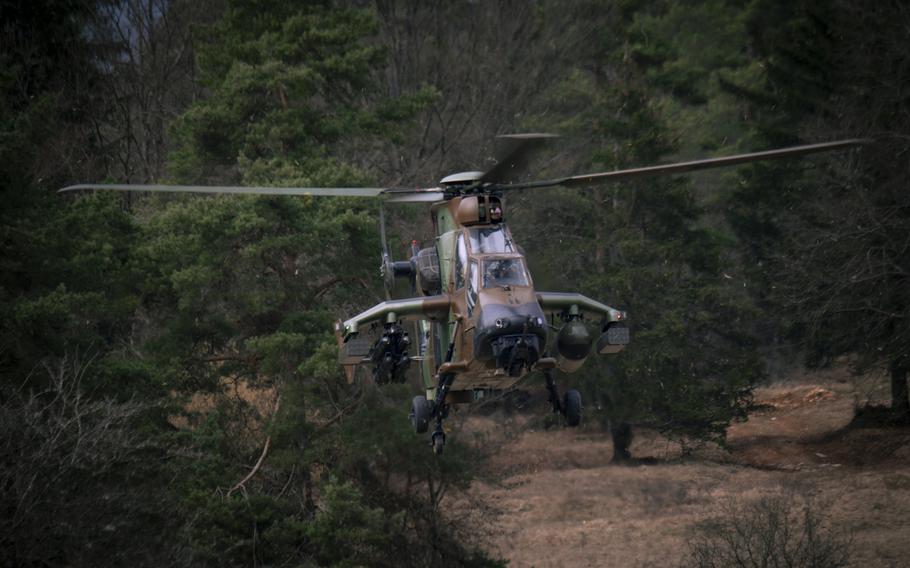 A French attack helicopter takes flight during exercise Allied Spirit.