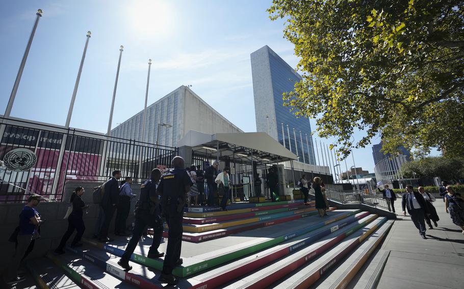 People arrive at the headquarters of United Nations ahead of this week's General Assembly in New York, Sunday, Sept 17, 2023.