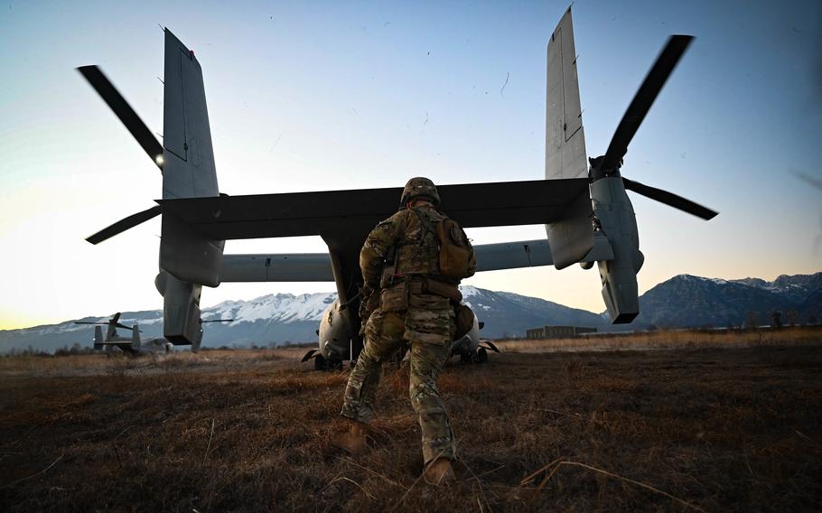 A Marine Corps MV-22 Osprey assigned to Marine Medium Tiltrotor Squadron 365 lands to pick up Army paratroopers during an exercise Dec. 7, 2021, at Aviano Air Base, Italy. 