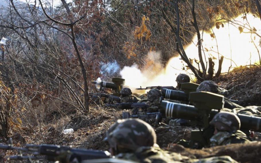 North Korean troops train at an undisclosed military base in North Korea on March 6, 2024.