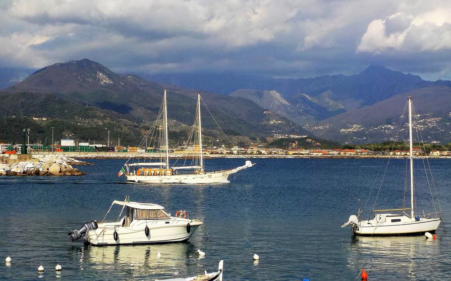 Sail boats leaving the Marina di Carrara harbor, Italy. Italian financial authorities said Friday that they have frozen a $700-million megayacht that has been linked in media reports and by anti-Kremlin groups to Russian President Vladimir Putin. 