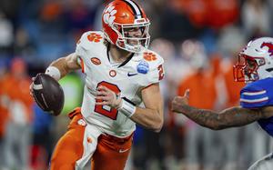 FILE - Clemson quarterback Cade Klubnik (2) drops back to pass during the Atlantic Coast Conference championship NCAA college football game between Clemson and SMU on Dec. 7, 2024, in Charlotte, N.C. (AP Photo/Jacob Kupferman, File)