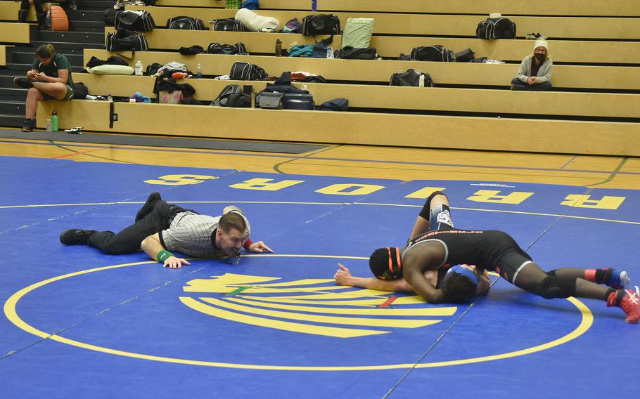 Spangdalem's Michael Kpade attempts to pin his opponent during a wresting match in Wiesbaden, Germany, on Saturday, Jan. 22, 2022.