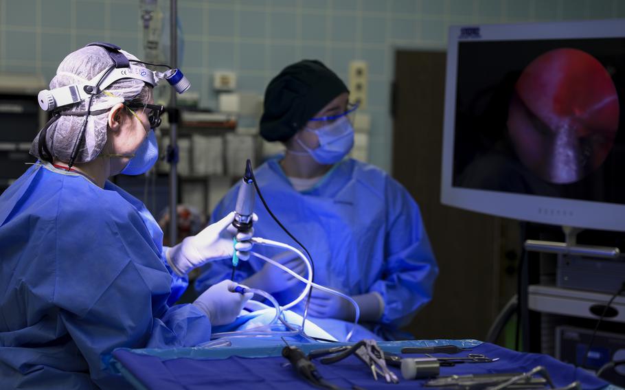 Army Dr. (Lt. Col.) Jessica Peck performs an intranasal cryotherapy procedure at Landstuhl Regional Medical Center, April 23, 2021. The procedure freezes nerves in the back of the nose to treat allergy-like symptoms which last more than a month.

Marcy Sanchez/U.S. Army