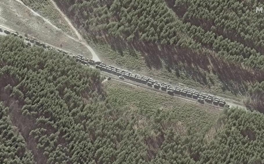 This satellite image provided by Maxar Technologies shows the northern end of a convoy of Russian vehicles southeast of Ivankiv, Ukraine, Monday, February 28, 2022.