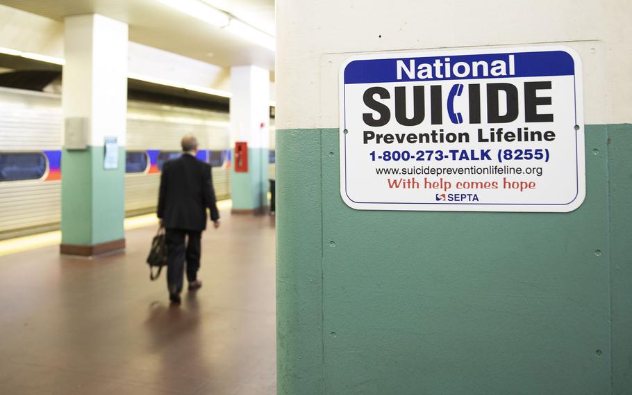 A sign for suicide prevention, photographed on the train platform at Suburban Station in Center City Philadelphia on Oct. 31, 2019. 