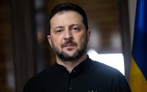 Ukrainian President Volodymyr Zelenskyy stands for a picture.