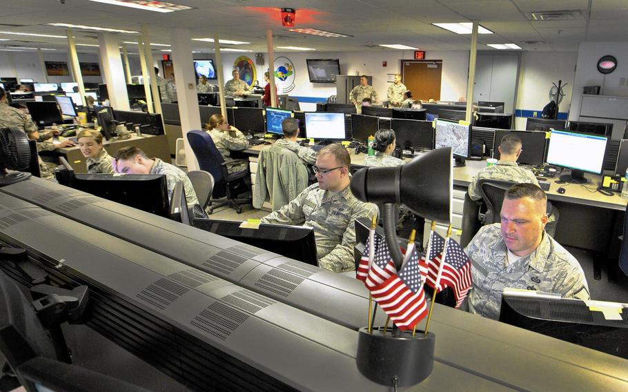 Airmen use their computers to support units for targeting ops and later for battle damage assessments from Langley Air Force Base.