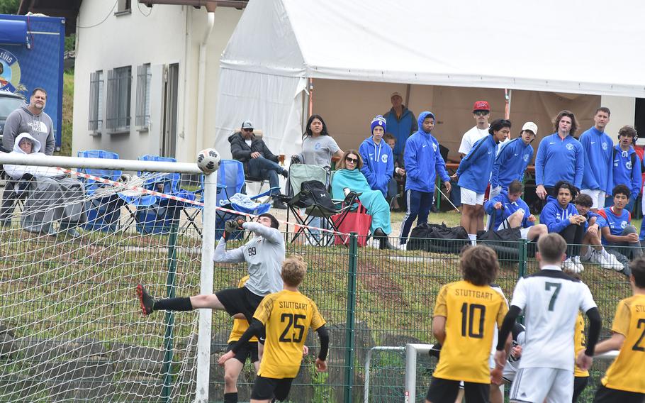 Stuttgart keeper Lucas Beckham punches a corner kick away in the semifinals of the DODEA-Europe Division I soccer championships Wednesday, May 17, 2023.