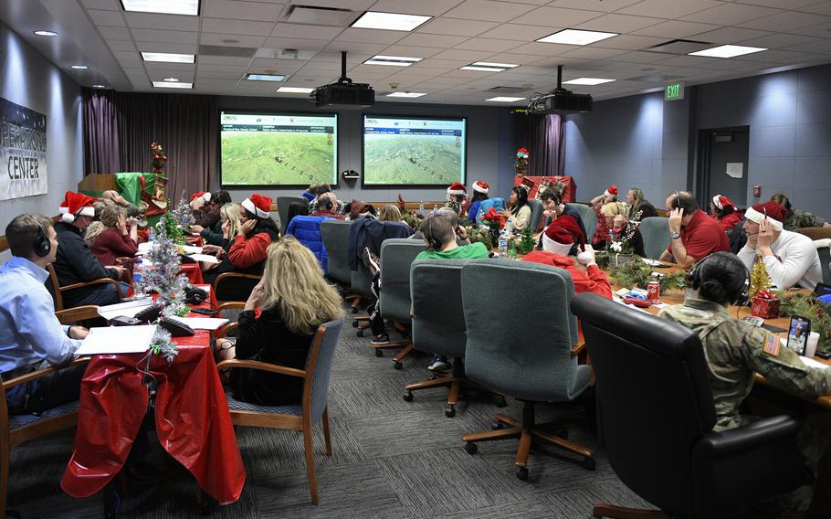 Nearly 1,000 volunteers cycled through the NORAD Tracks Santa Operations Center at Peterson Space Force Base in Colorado on Dec. 24, 2022. Volunteers providing updates on Santa's location worked in two-hour shifts answering phone calls from around the globe. The center will be back this December.