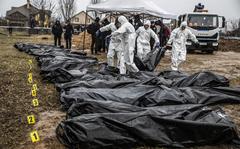 Bodies exhumed from a mass grave in Bucha, Ukraine, on April 8, 2022.