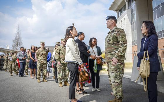 Colleagues and friends line up to bid farewell to Lt. Gen. William Burleson after he relinquished command of Eighth Army at Camp Humphreys, South Korea, Friday, April 5, 2024.