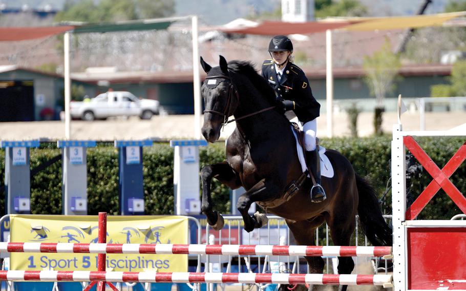 Sgt. Samantha Schultz begins the equestrian course on a randomly drawn horse during the 2018 Modern Pentathlon World Cup in Los Angeles.