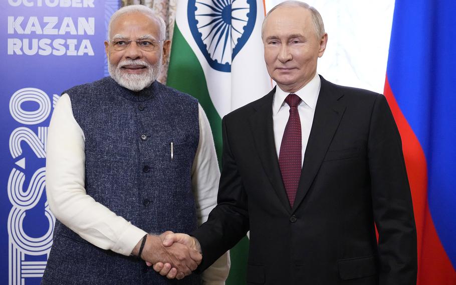 Russia’s President Vladimir Putin meets with Indian Prime Minister Narendra Modi