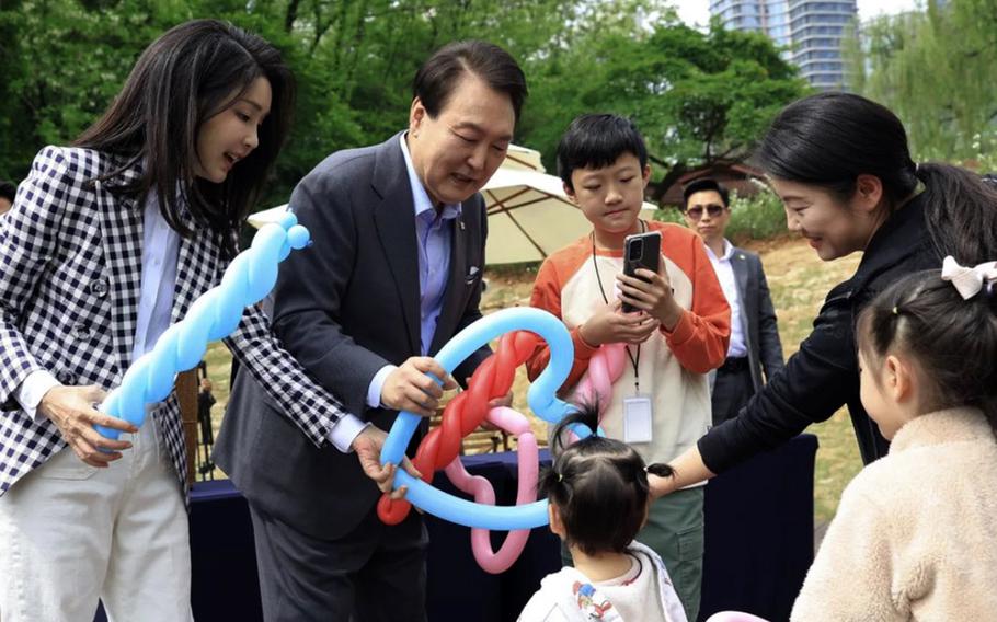 South Korean President Yoon Suk Yeol and first lady Kim Keon Hee attend the opening of Yongsan Children's Garden in Seoul, South Korea, May 4, 2023. 