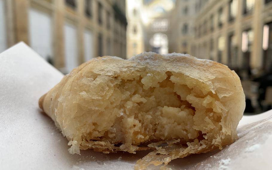 A cross-section of a sfogliatella from La Sfogliatella Mary in Naples shows the rich, creamy ricotta filling inside. 