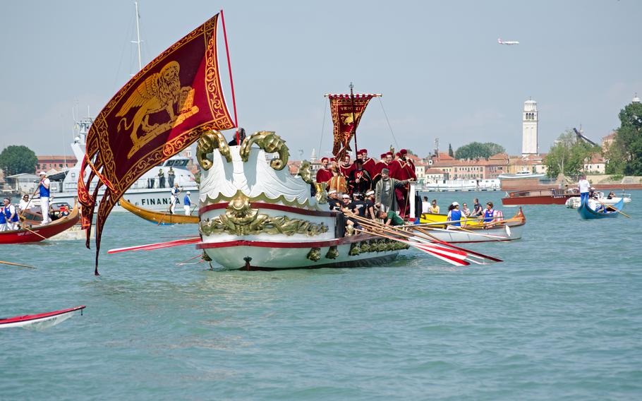 A maritime parade of decorated rowboats is part of the Marriage of the Sea ceremony, one of the celebrations of Ascension Day in Venice.